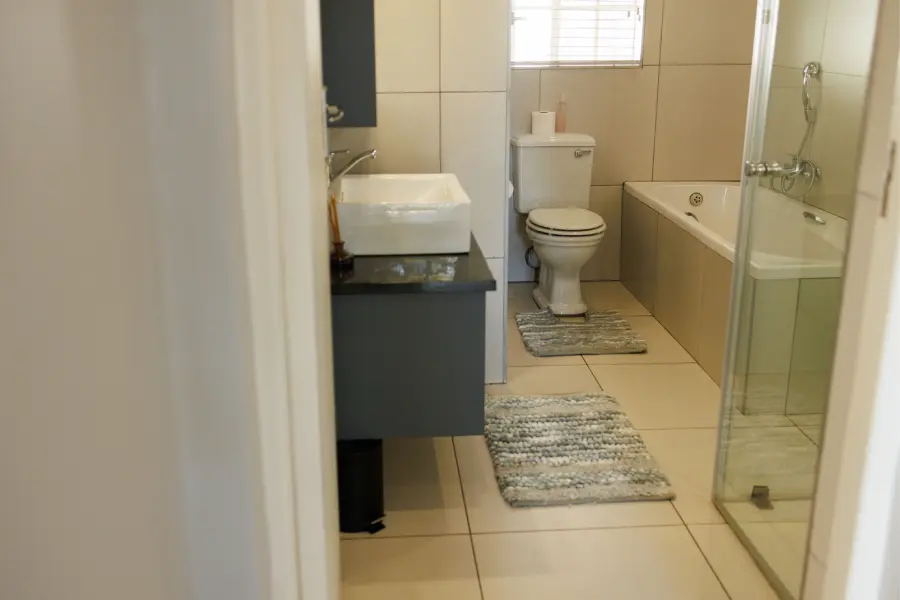 A bathroom with bath and shower at Goedehoop 2