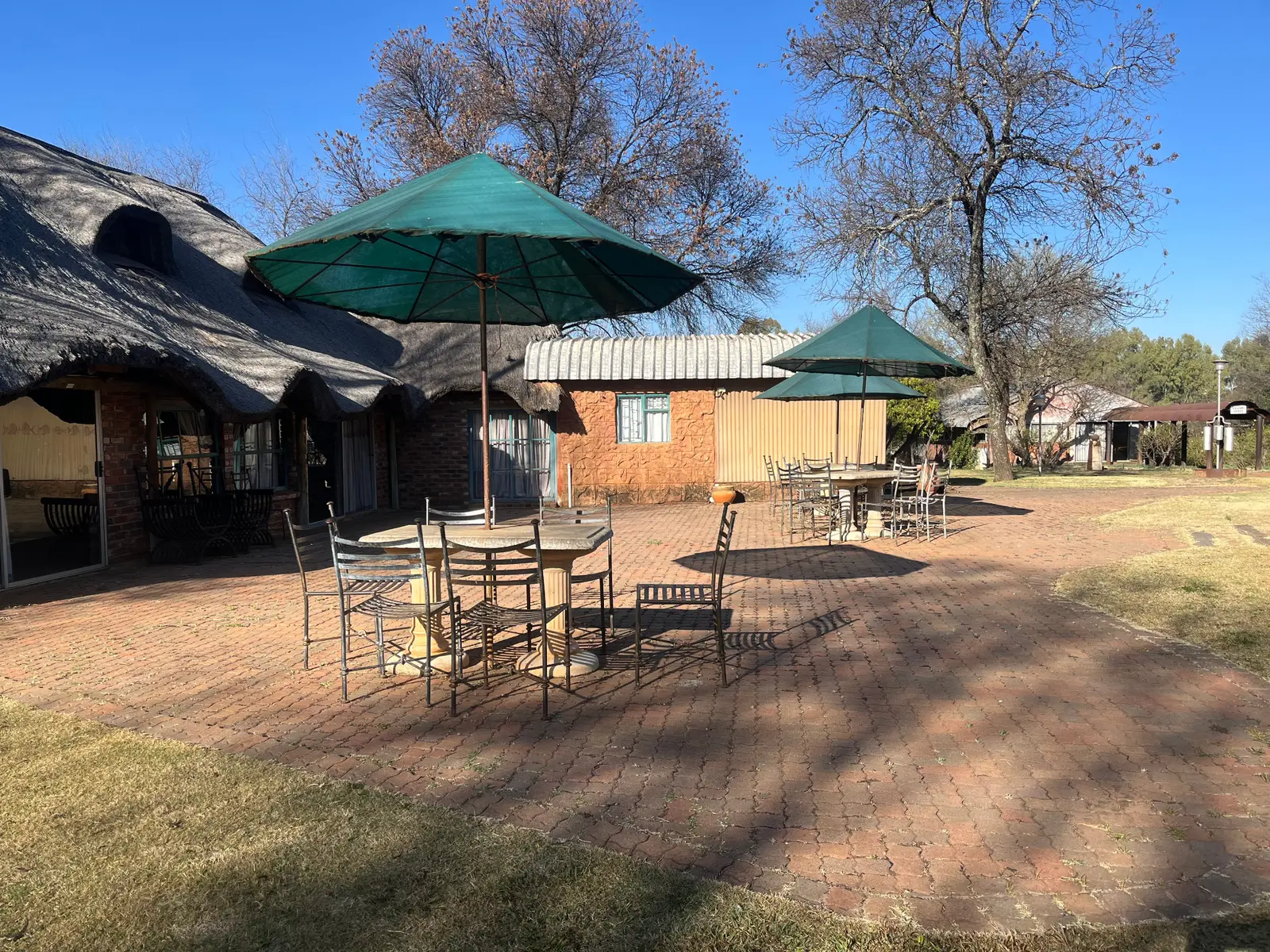 The outdoor patio and seating area at Raaswater River Lodge