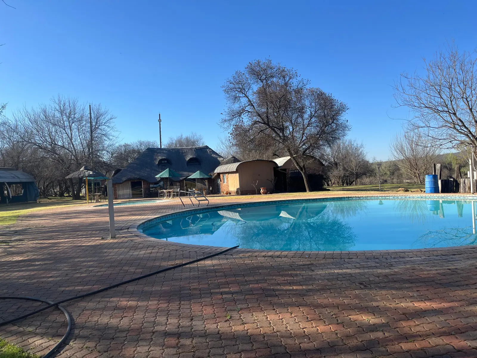 The swimming pool at Raaswater River Lodge